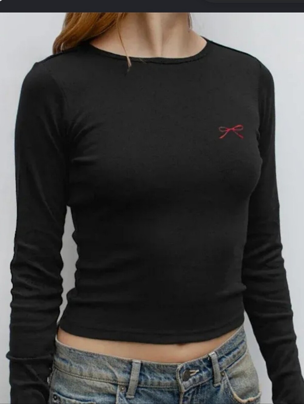 XOXO Black Long-Sleeve Cropped Top with Red Bow Accent